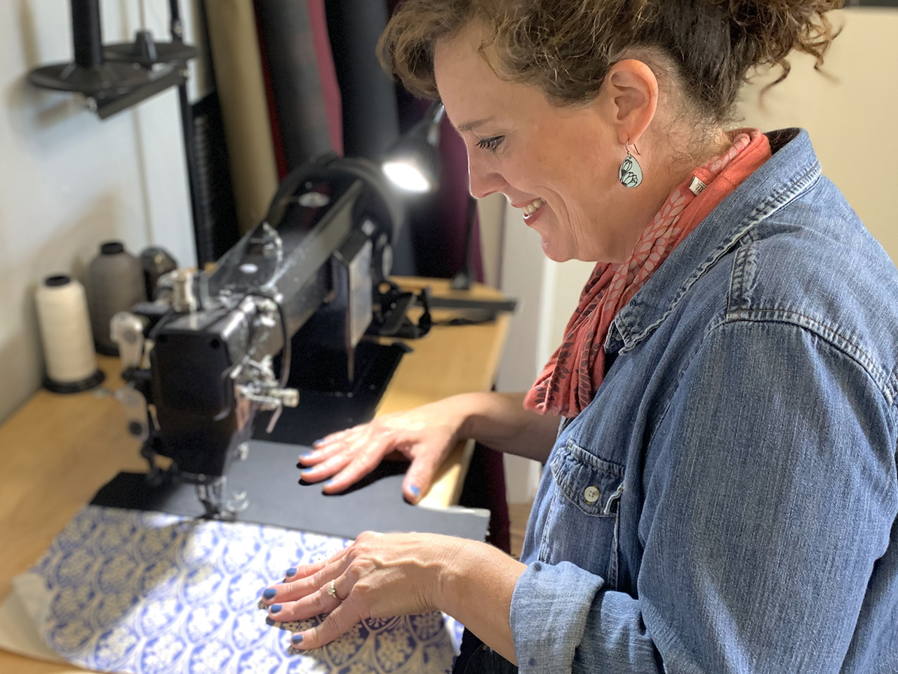 Heidi sewing with fabricator