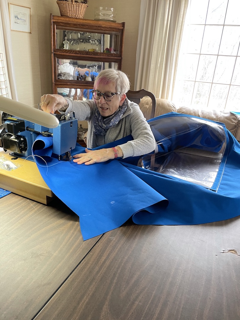 A professional seamstress, Pat is comfortable behind a sewing machine.