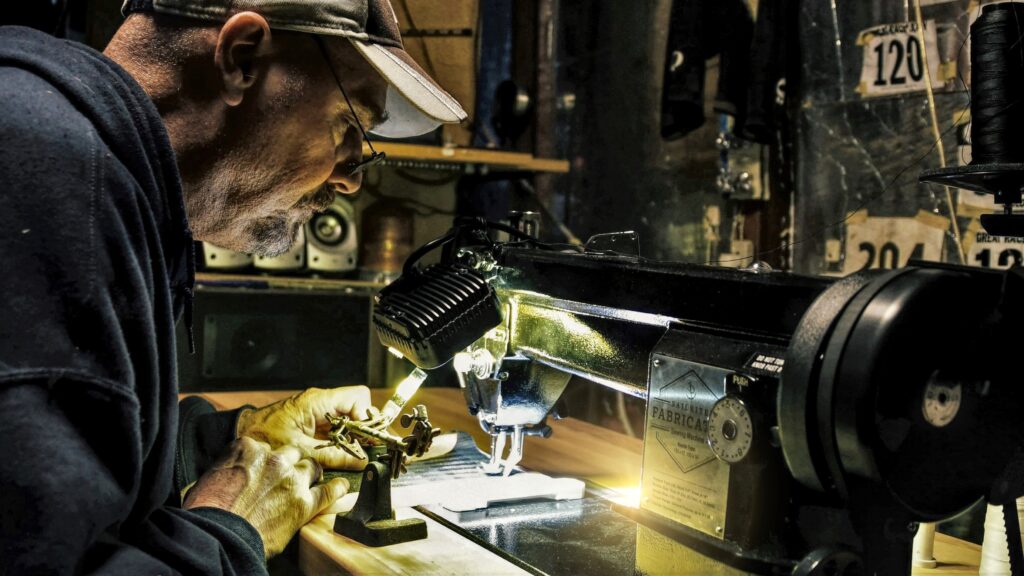 Jerry sewing with his Fabricator machine.